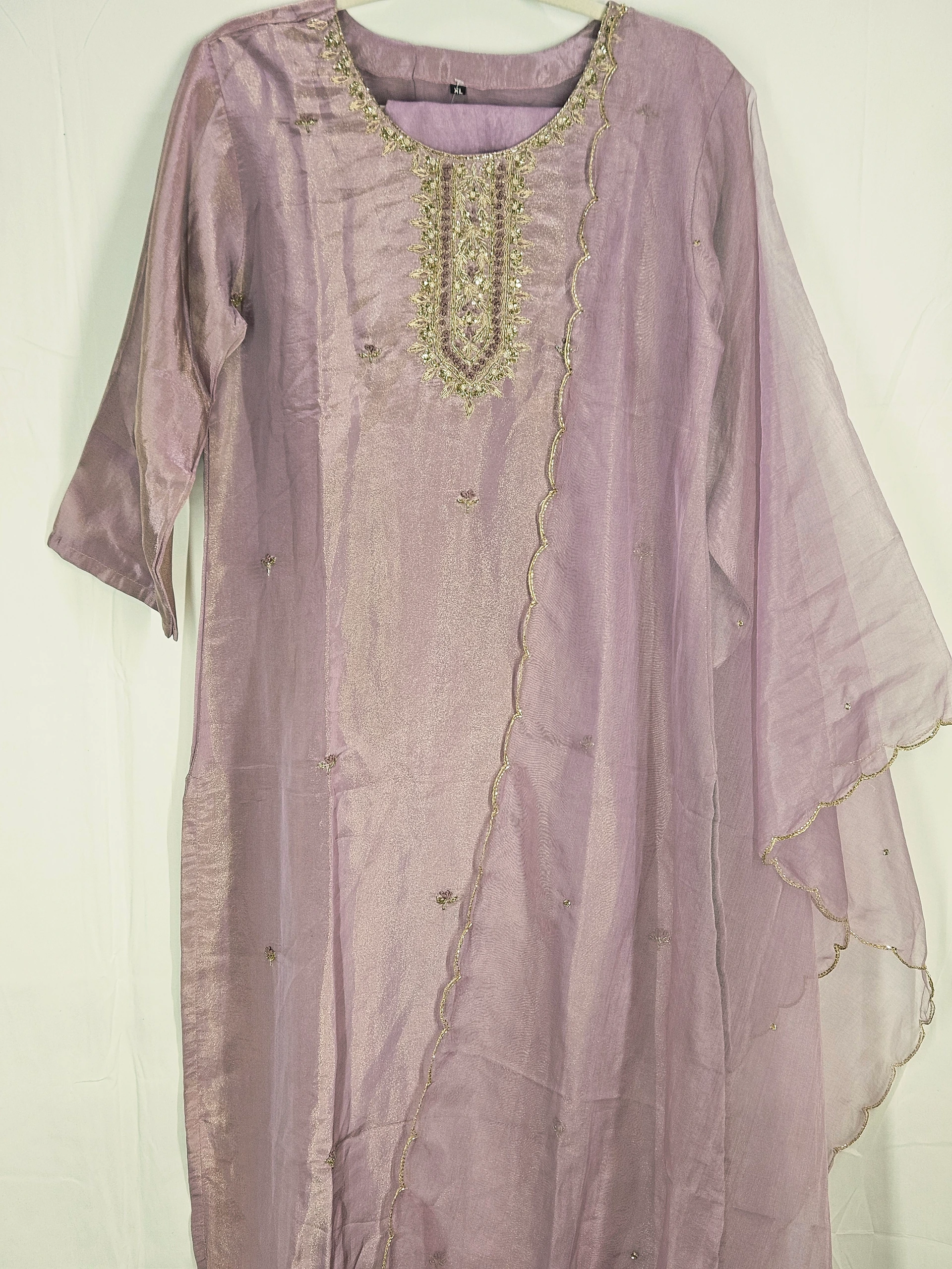Lavender pure tissue silk dress with intricate golden embroidery on the neckline, sheer sleeves, and scalloped detailing, perfect for weddings and festive occasions.