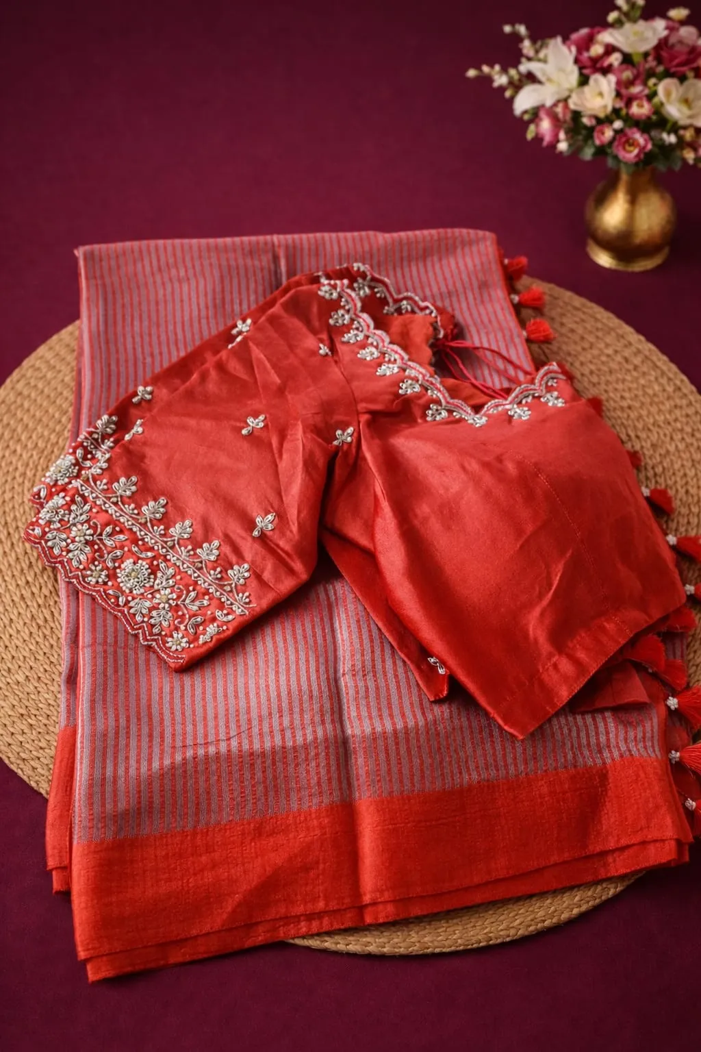 Elegant Pure Banarasi Silk Tissue Saree in red with intricate floral embroidery, perfect for weddings and festivals.