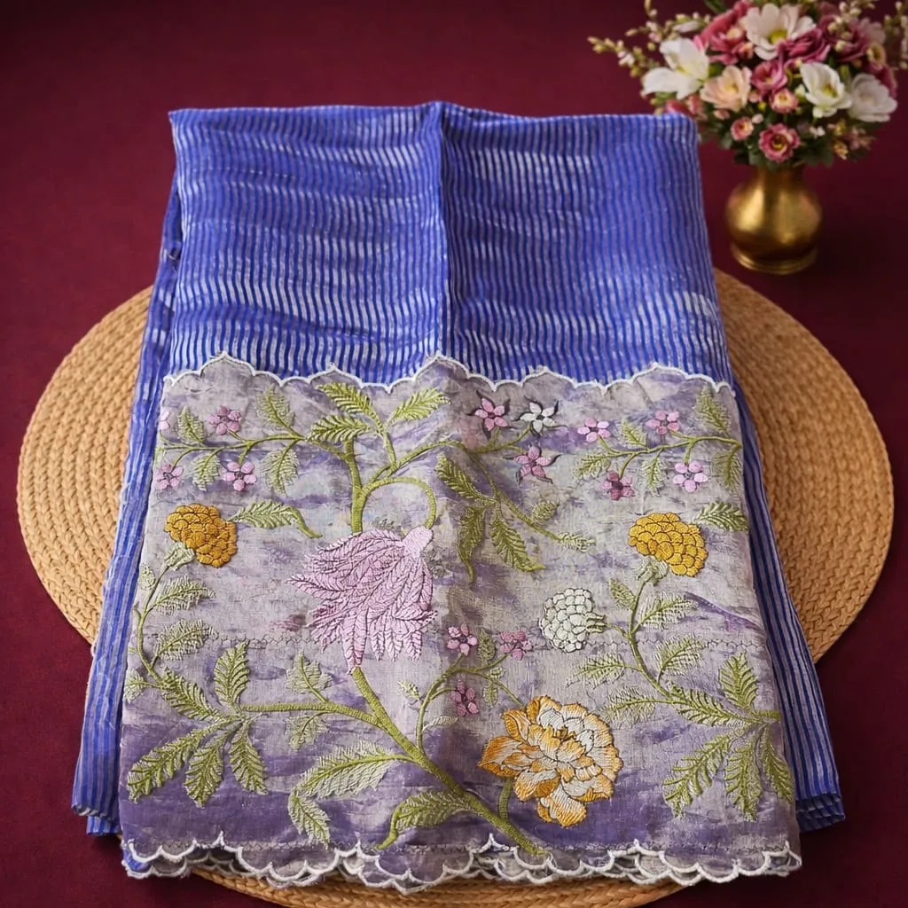 Exquisite Pure Banarasi Kora Tissue Saree in blue with intricate floral embroidery, perfect for weddings and celebrations.