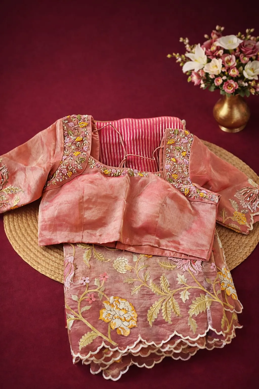 Exquisite Pure Banarasi Kora Tissue Saree in golden with intricate floral embroidery, paired with a matching blouse.
