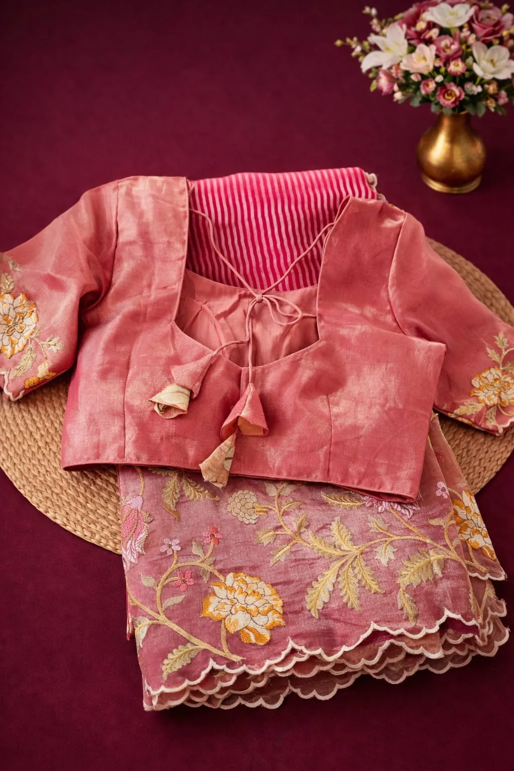 Exquisite Pure Banarasi Kora Tissue Saree in golden hues with intricate floral embroidery, paired with a matching blouse.