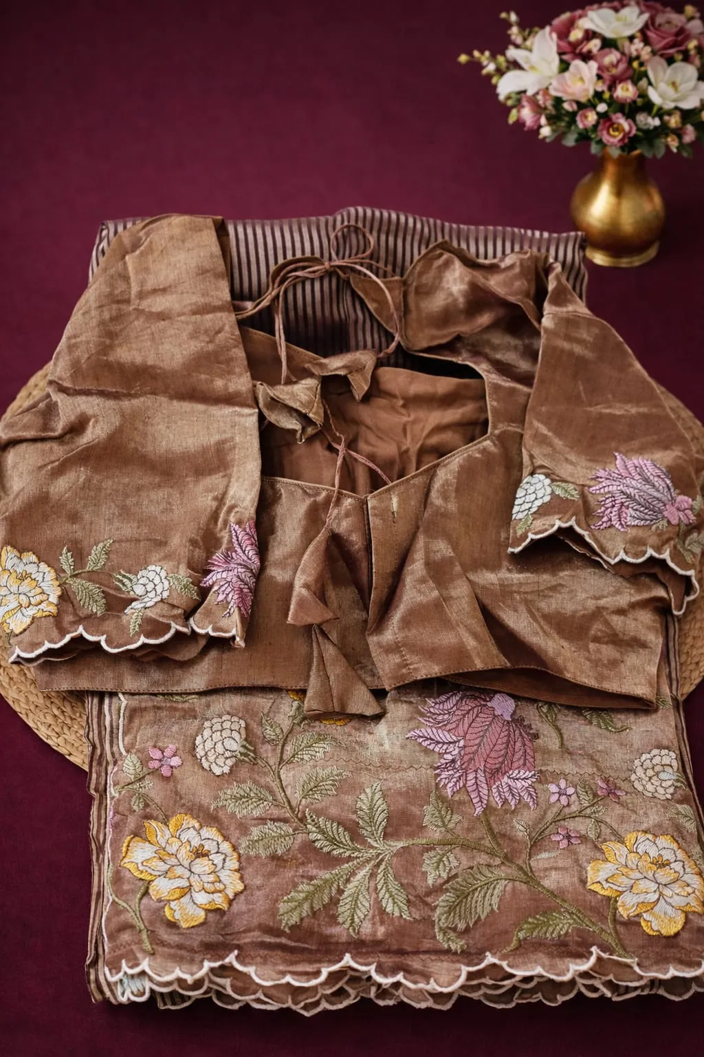 Pure Banarasi Kora Tissue Saree in rich brown with intricate floral embroidery, ideal for weddings and festive occasions.