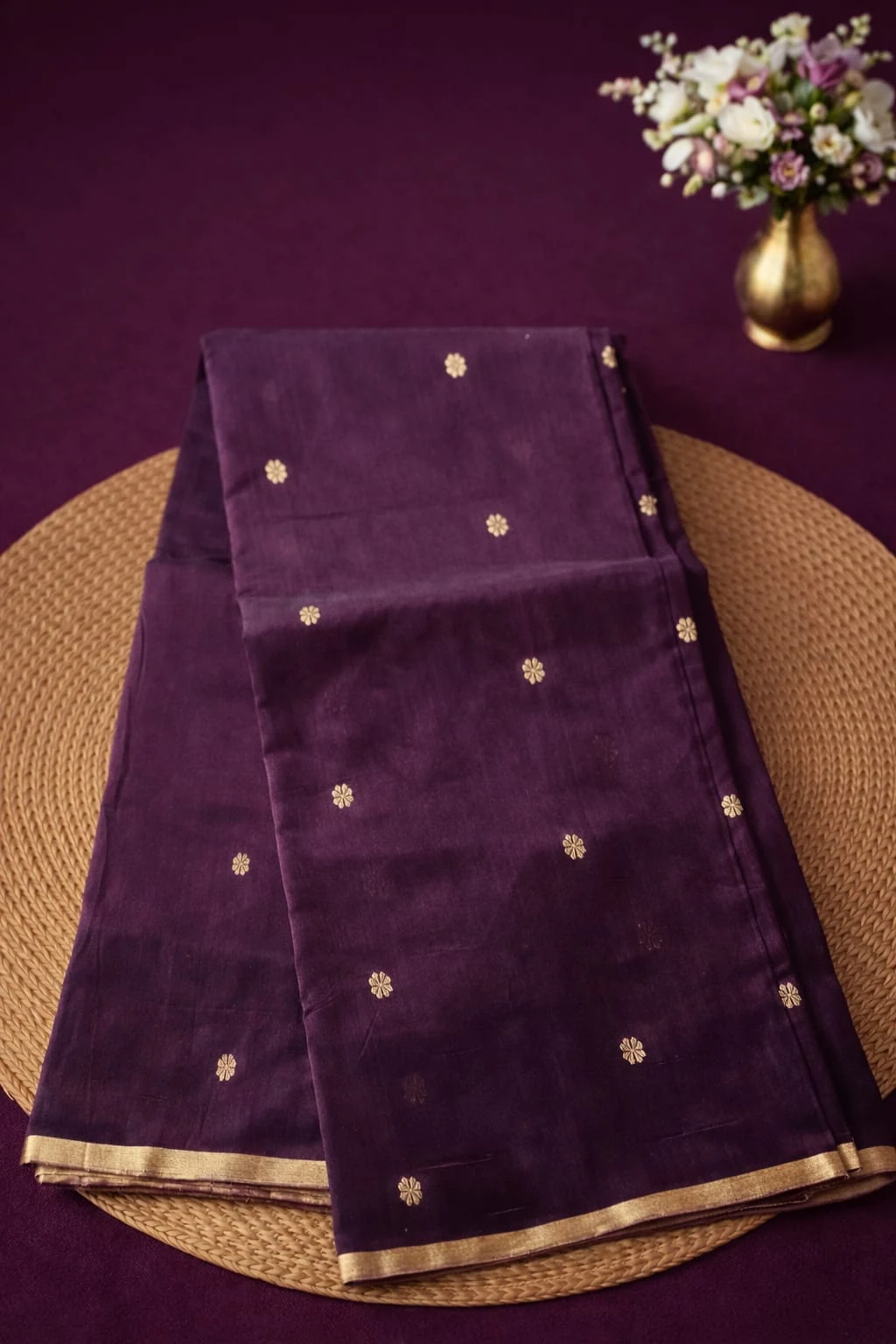 Pure Chanderi silk pattu saree in deep purple with gold zari floral motifs and a gold border, ideal for weddings and festivals