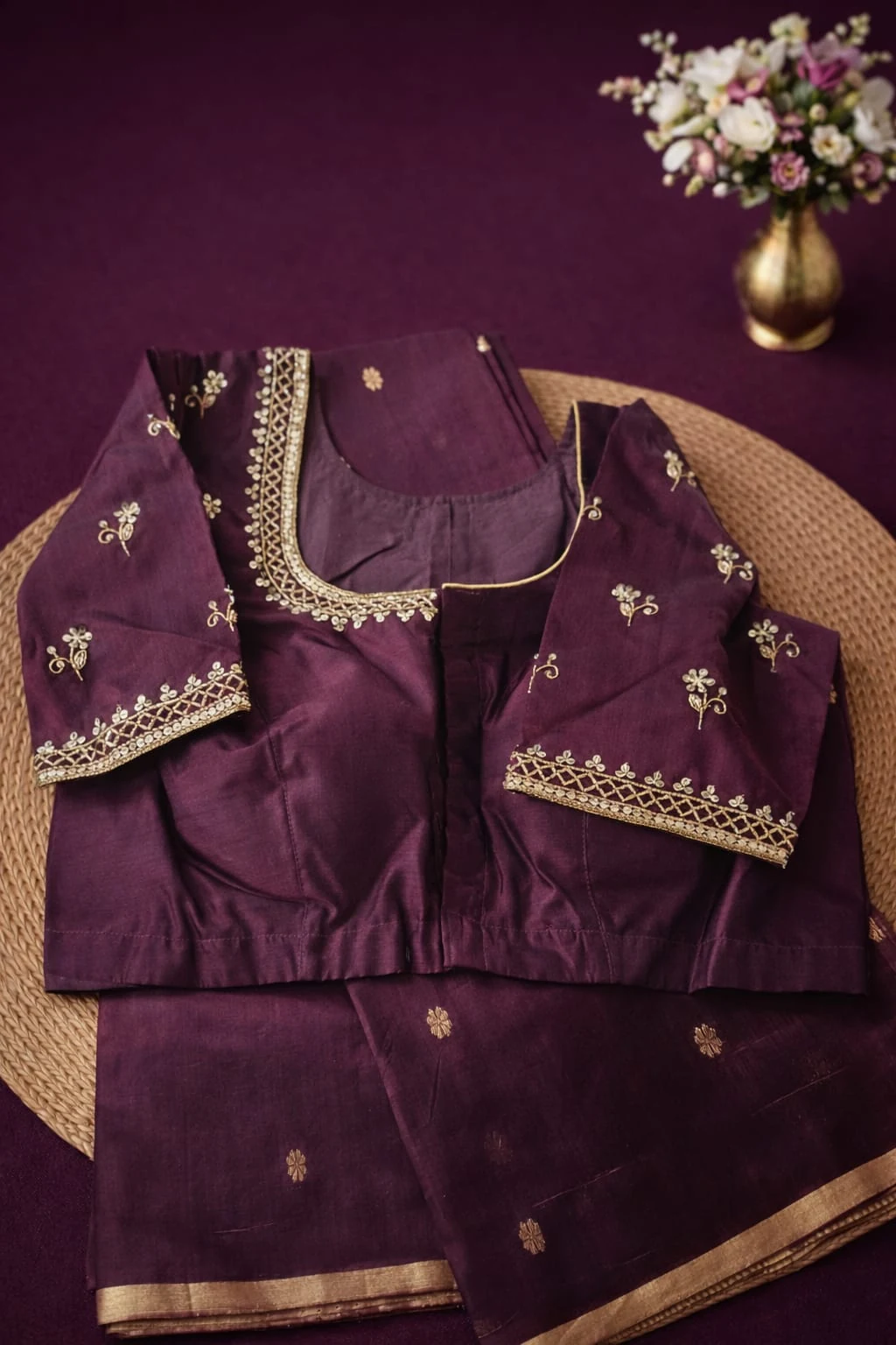 Pure Chanderi silk pattu saree in deep plum with gold zari border and floral embroidery, handwoven for weddings and festivals