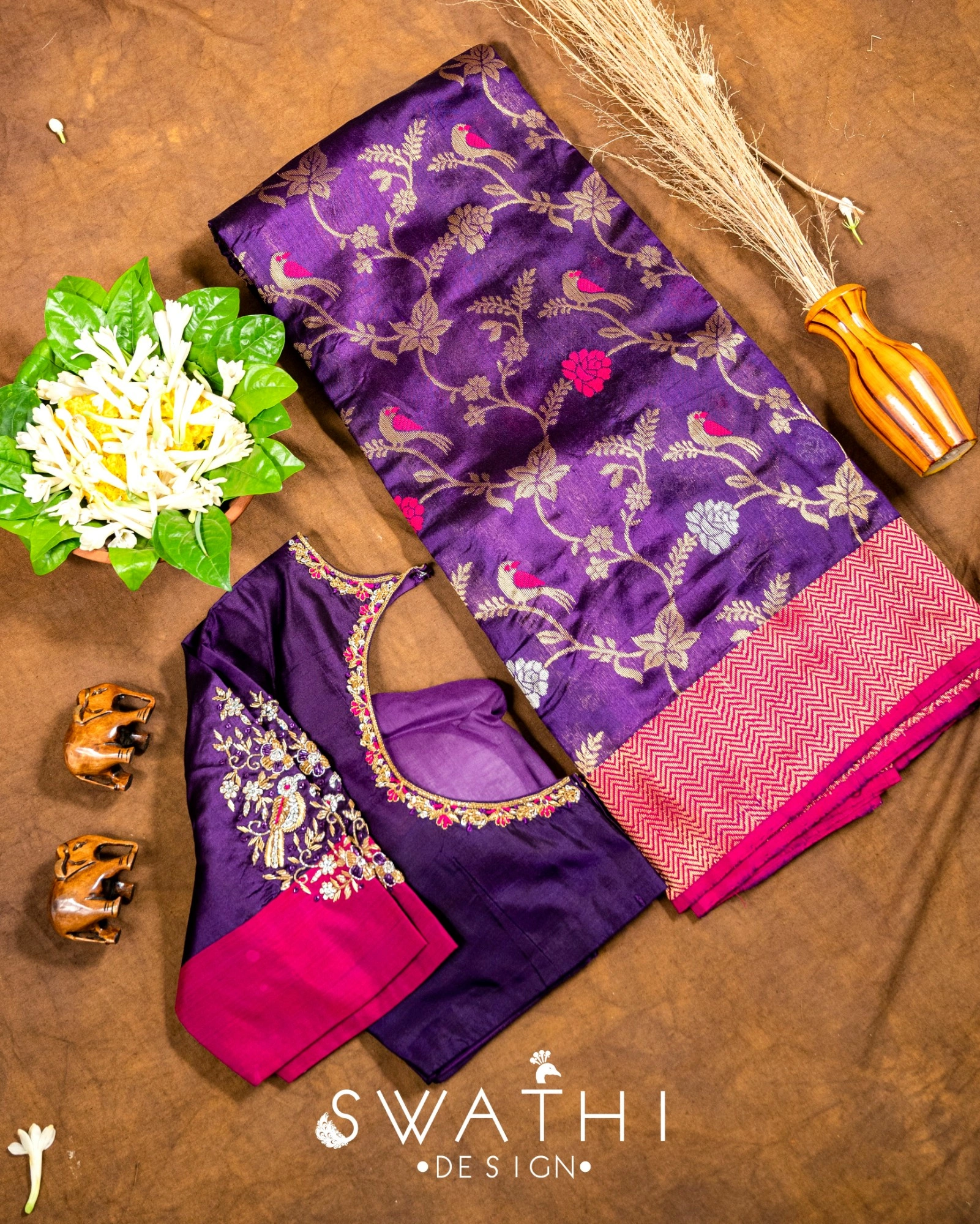 Pure Chanderi pattu saree in rich purple with silver floral motifs, pink border, and maggam work blouse set.
